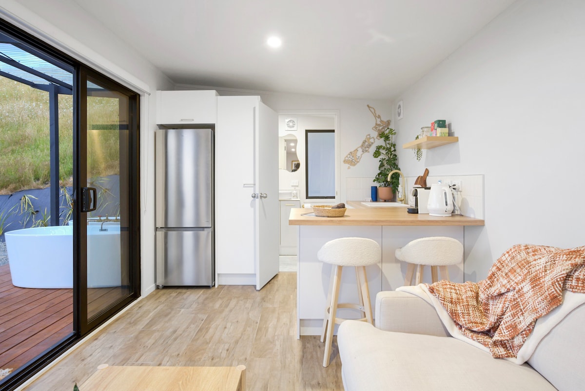 Popular Airbnb listing: Nestled Nook - Luxury Cabin with 2 Outdoor Baths in Western Bay Of Plenty District