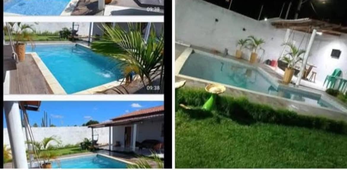Two inviting pools are featured, surrounded by manicured green grass. The clear blue water reflects the sunlight, creating a calm atmosphere. Potted plants are placed strategically along the pool edges, enhancing the relaxing outdoor setting.