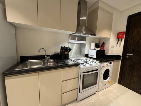 Top performing Airbnb: ASHRI HH | Elegant Studio in Damac Hills | Carson in Al Hebiah Third