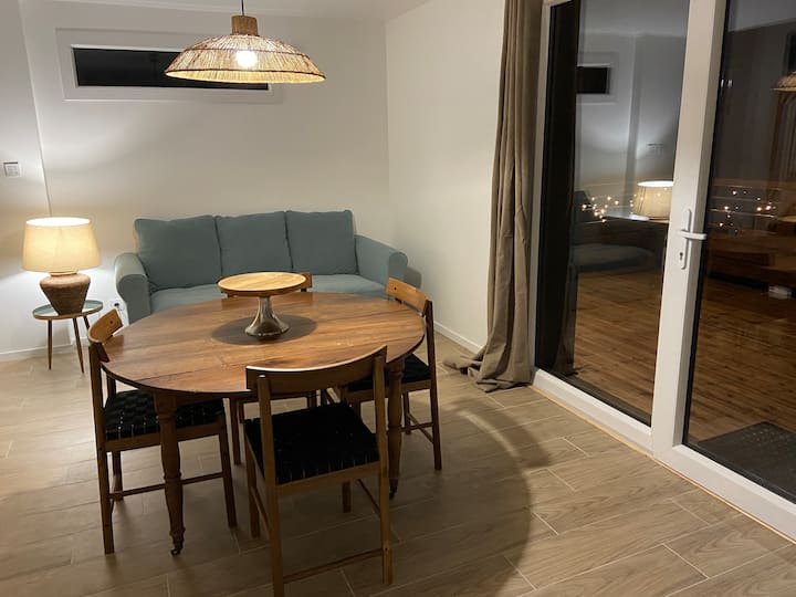 Salón del apartamento Le Hêtre equipado con un sofá cama de 2 plazas
