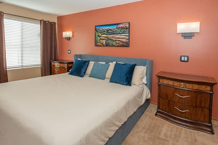 With a king-sized bed, dimmable bedside lighting, charging ports for all your devices, and a 42" Roku TV, you have everything you need for a quiet evening in bed. The bedroom also includes a large window with blackout curtains.