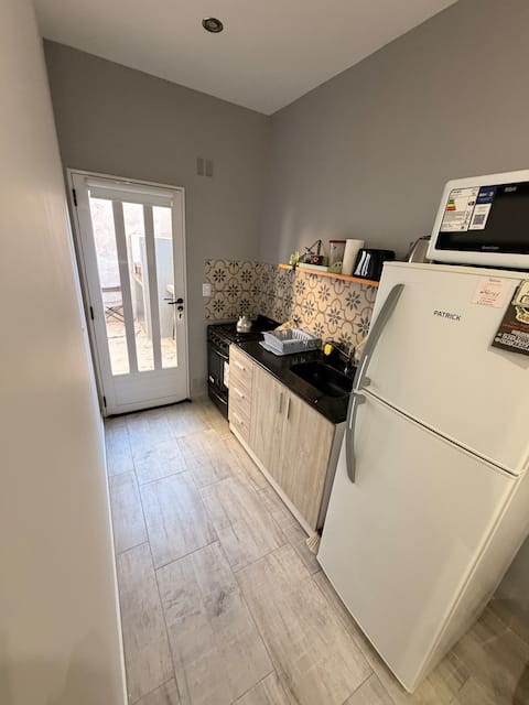 Top Airbnb: Brand new one-bedroom apartment with a grill, Wi-Fi, kitchen, and parking in Partido De Monte Hermoso