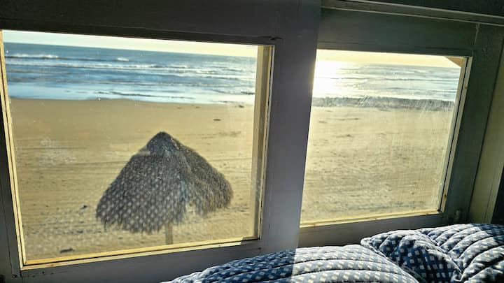 View from the bed.  Fresh ocean breeze or Air Conditioning.  Your choice.