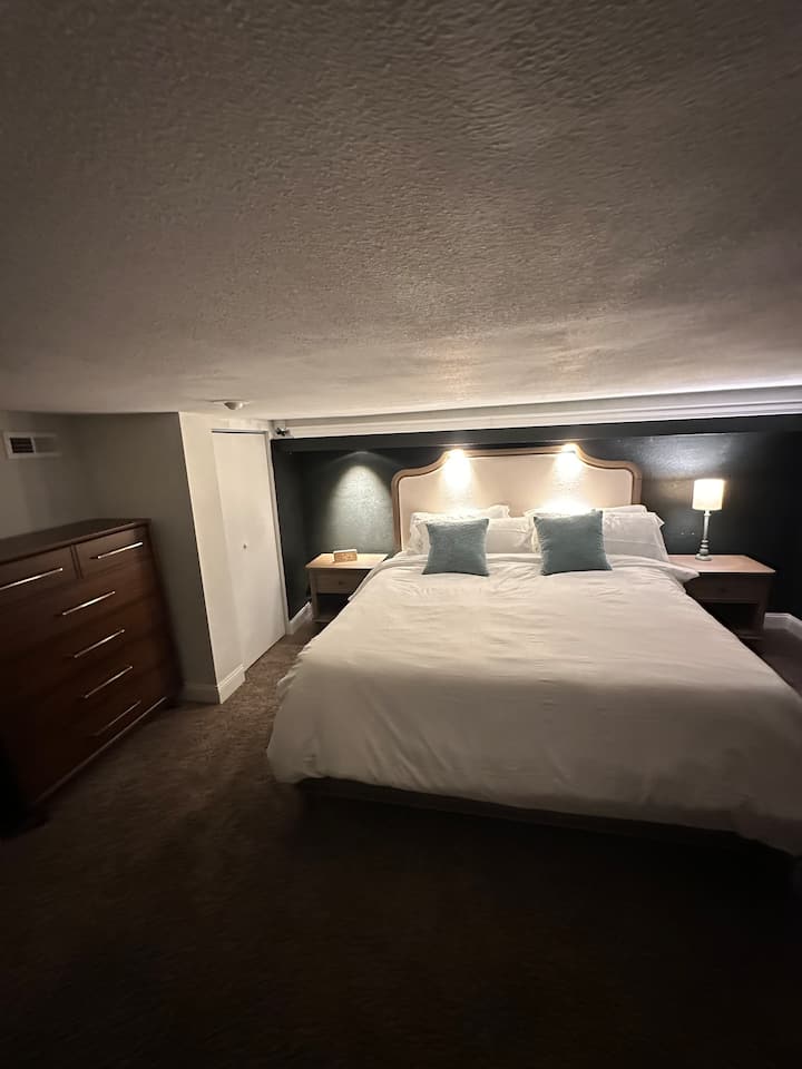 King size bed with 14 inch thick memory foam mattress with high thread count sheets, for your ultimate comfort.