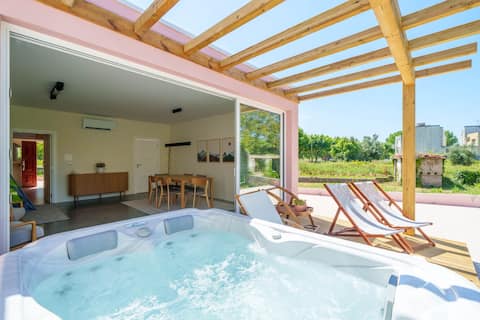 Riverfront house with jacuzzi & kids play area!