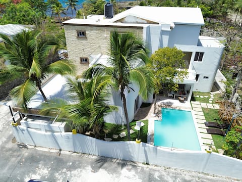 Beautiful and spacious villa steps away from two beaches