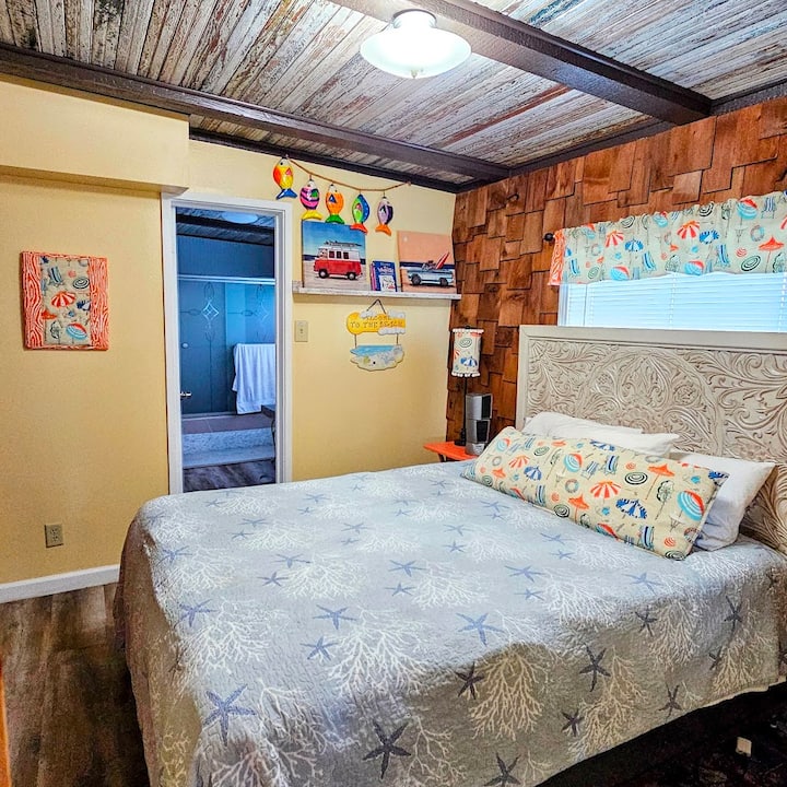 Guest Bedroom with queen size bed next to full bath