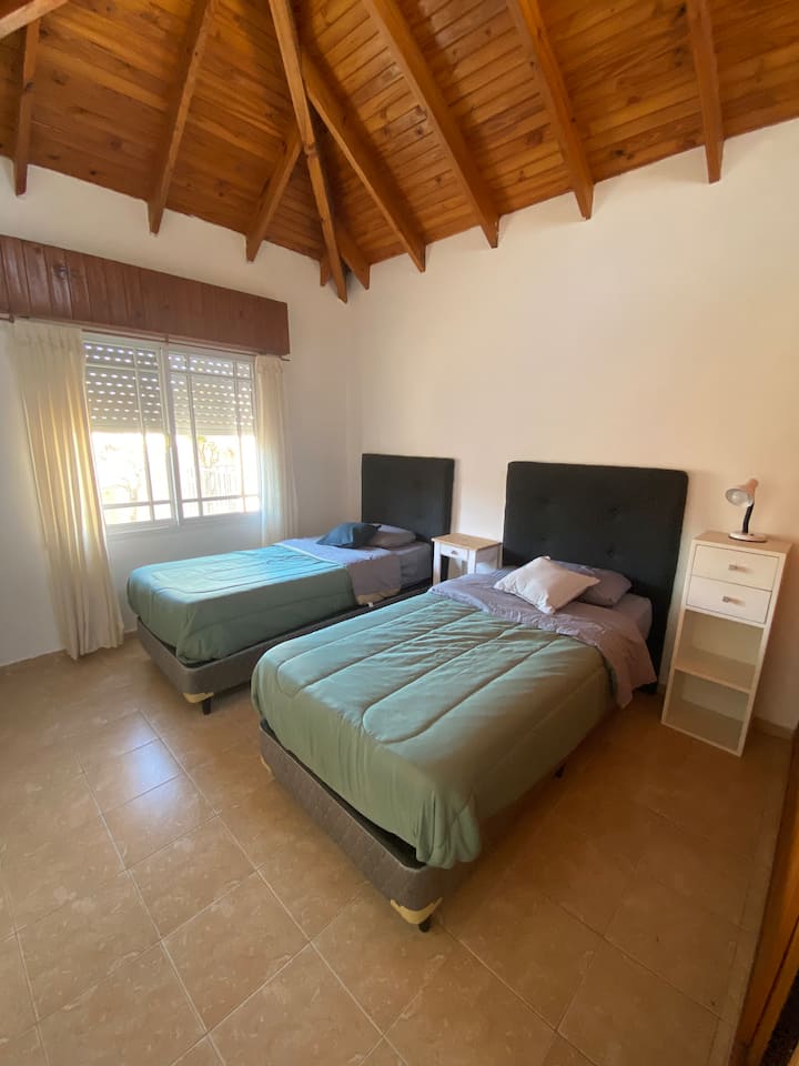 Спалня с 2 легла 1 1/2 места на първия етаж.