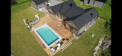 Newly built villa by lake and Alpine