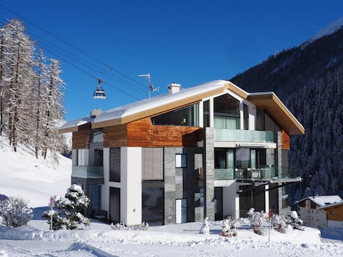 Alpine lodge 3-room apartment with terrace, spa & pool