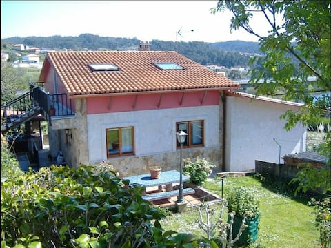 A villa in Miño with ocean views.