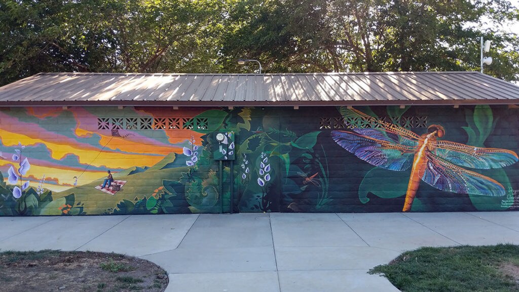 Murals in Austin Park by local visionary artist Michael Divine. at Panoramic View Campsite – bring your own tent or small camper in Hidden Valley Lake