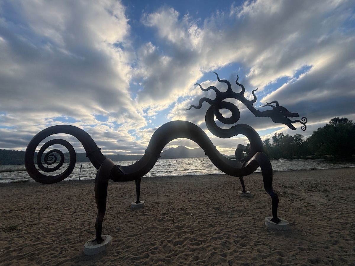 Dragon sculpture in Austin Park, Clearlake 20 minutes away. Nice in Winter. Rent boats. at Panoramic View Campsite – bring your own tent or small camper in Hidden Valley Lake