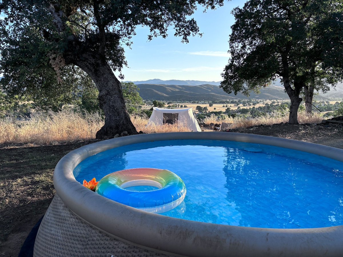 Our "cowboy" above ground 2600 gallon pool is open June through October and sooooo refreshing when it's over 90 here. We have pool toys. It's filled with wonderful well water, like
