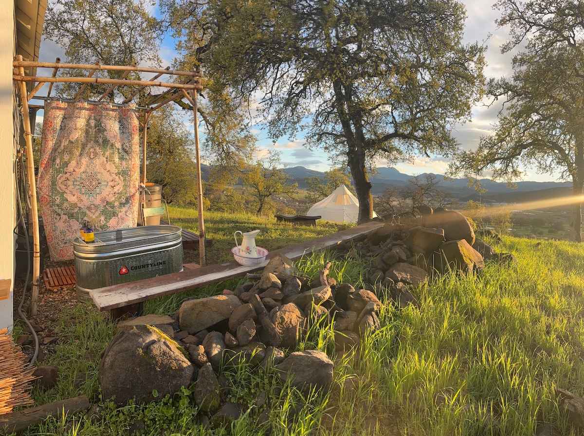 We created a magical outdoor bathroom that brings in the sunshine and the spectacular view. Waterproof boho style privacy curtains can be drawn all the way around (or not) as you p