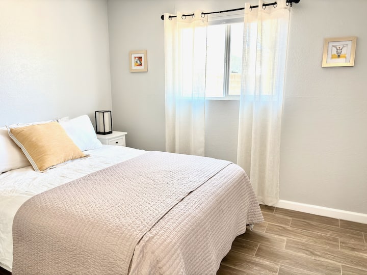Hotel-grade cotton linens, black-out shades, USB chargers, full length mirror.