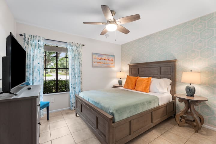 The third bedroom features a queen memory foam bed, dresser, closet, and TV. Ceiling fan and light work by pull strings—just turn on the wall switch first.