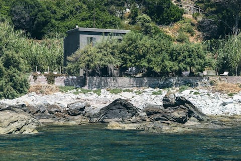 At Casa di U Scogliu. House with your feet in the water.