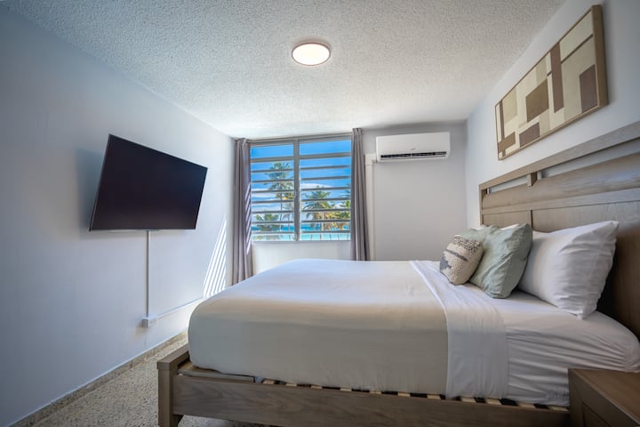 King size bed master room with 55" Smart TV