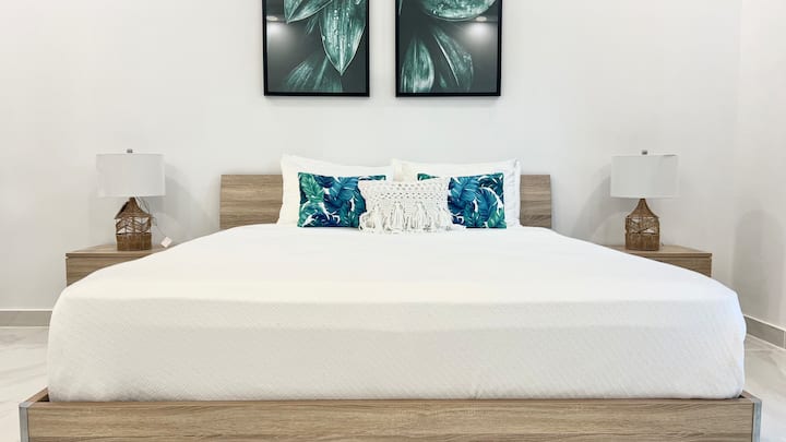 King bed in Bedroom 1 of 2. 