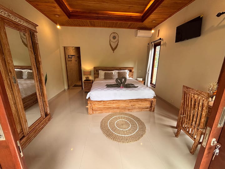 Room 2 entrance with AC and storage