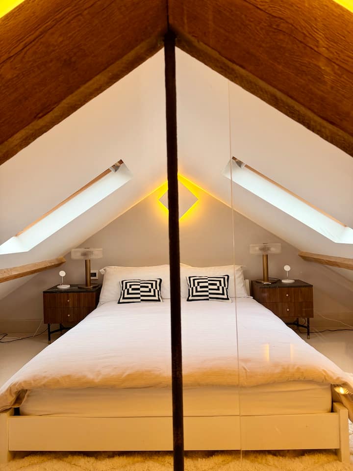 Mezzanine dreams — premium bedding, perfect stillness, and nowhere else to be.