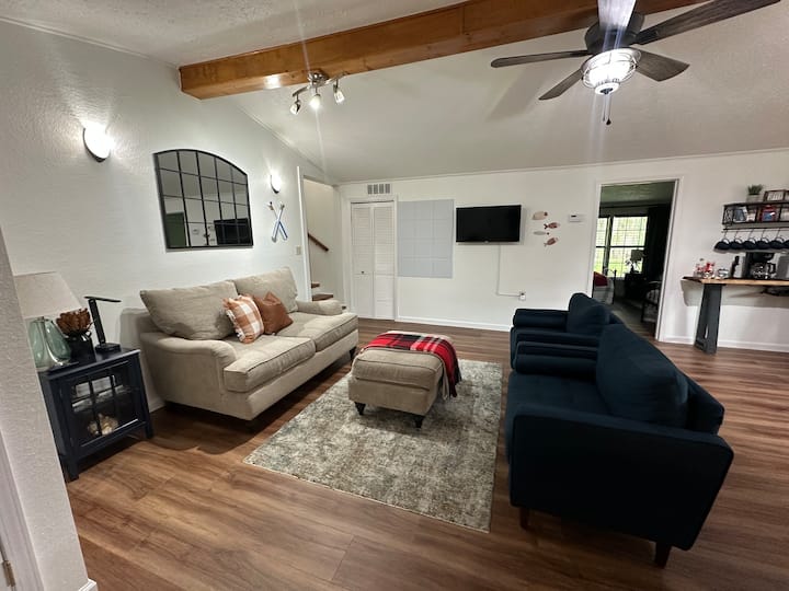 The spacious open living/dining area and back porch work great for informal girls’ nights and family reunions.