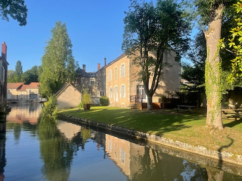 By the river, large house with garden