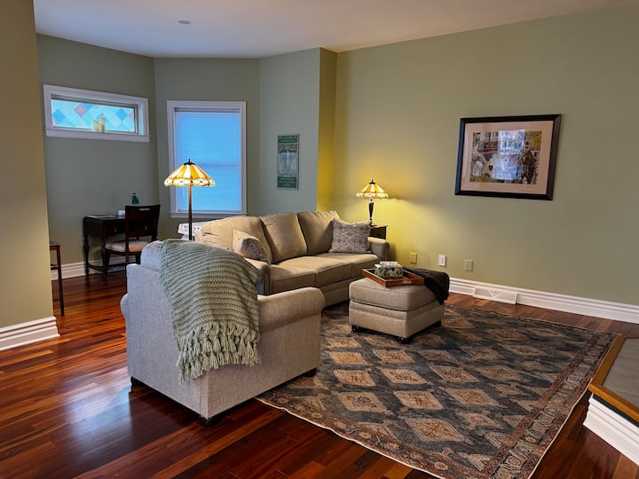 Living room showing fold-out couch and chair.