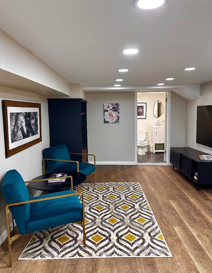 This is a fun and functional space. You will find ROKU free channel tv and twin beds for lounging to watch your favorite movie. Games and puzzles live here. This adjoins a full size bath and a laundry nook tucked around the corner.