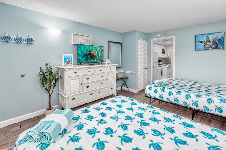 Peaceful and relaxing bedroom with two comfortable  queen  beds
