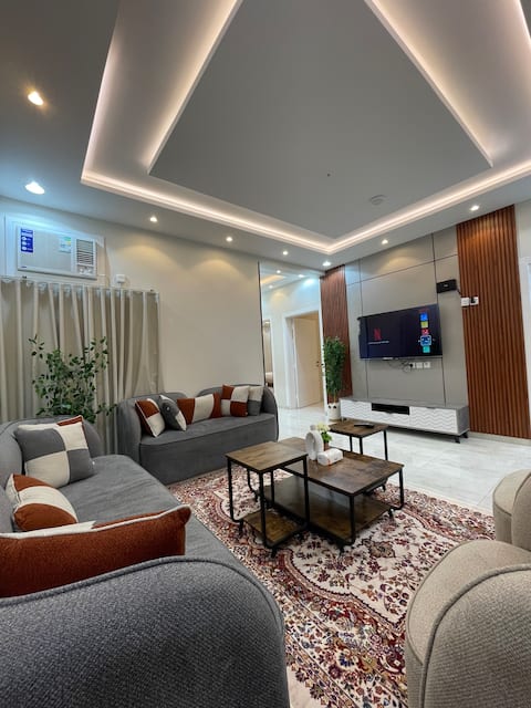 Elegant hotel apartment with three bedrooms and a living room