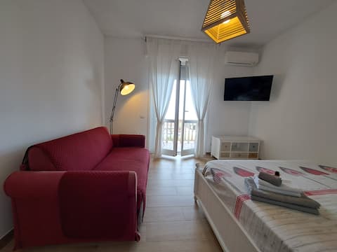Beachfront apartment with private parking