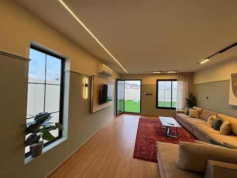 Elegant apartment with two bedrooms, outdoor seating and beautiful atmosphere