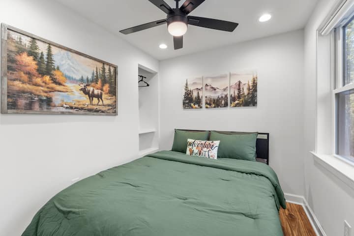 Cozy up in the queen size bed (downstairs bedroom)