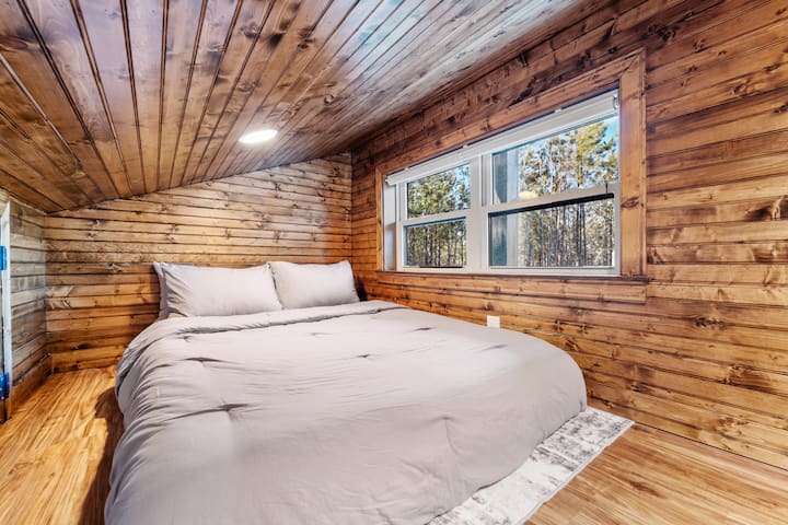 Loft bedroom, which requires using the ladder to access. 