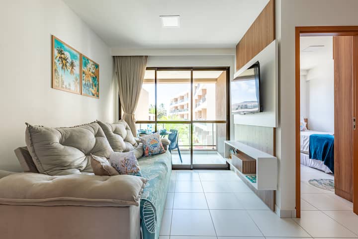 2.30-meter pull-out sofa with 55-inch smart TV, air-conditioned room and blackout curtain