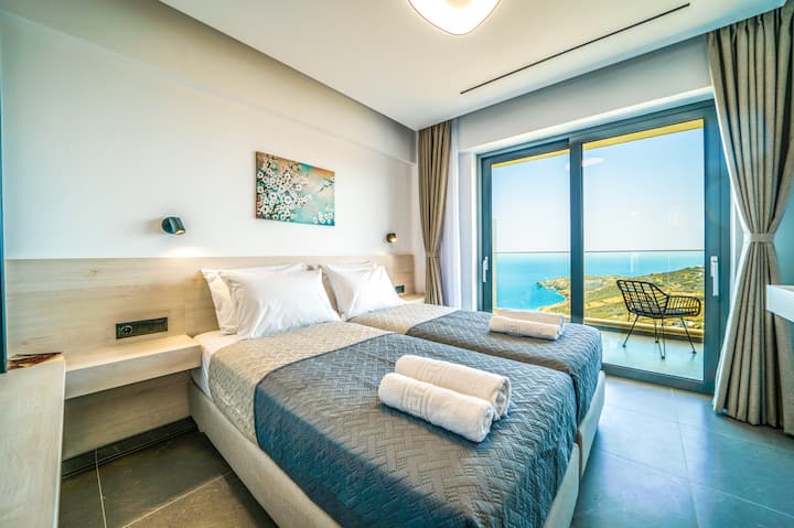 First floor - Bedroom 2 with two single beds (or king) and private balcony with sea view