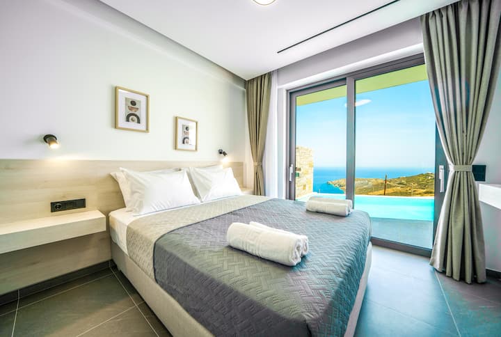 Ground Floor: Bedroom 1 with queen bed and pool access