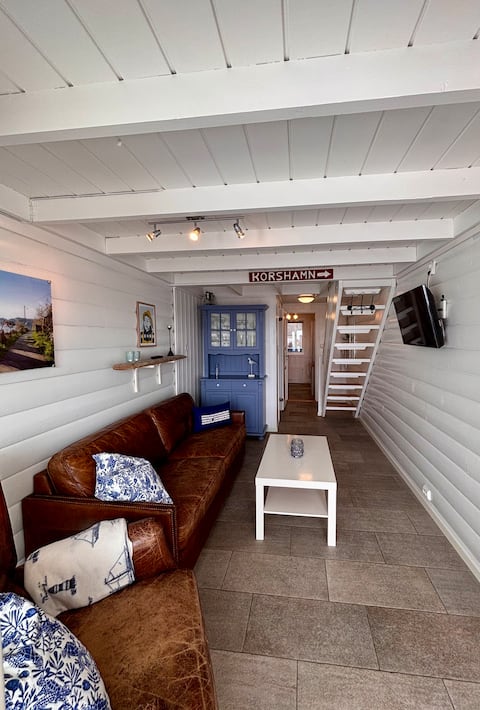 Popular Airbnb listing: Waterfront Rorbu | Balcony | Sea Views | Korshamn in Lyngdal