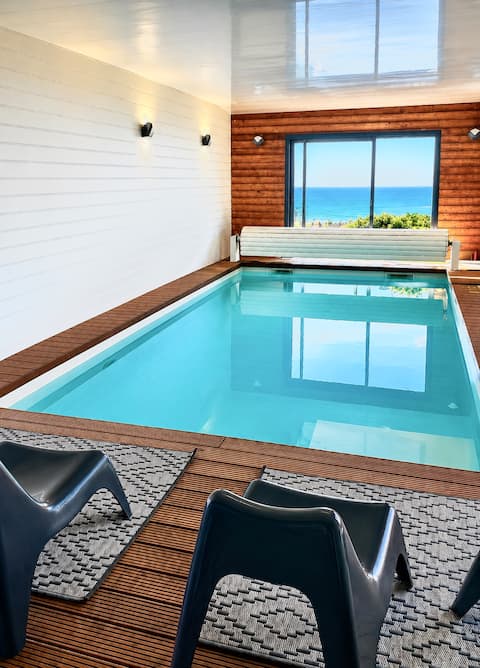 Sea view villa with heated indoor pool & spa