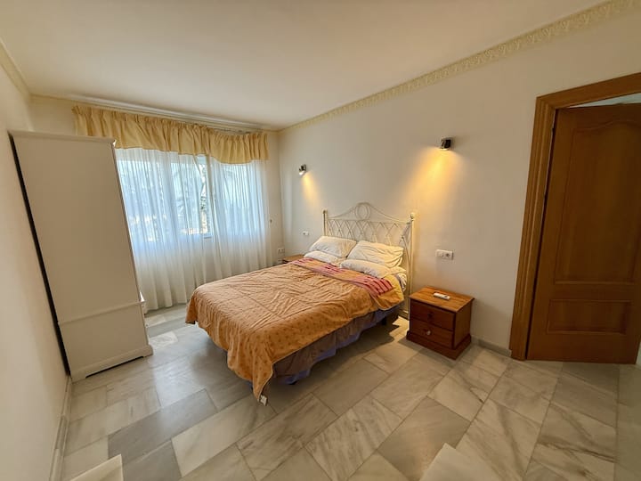 Large double bedroom, sea views & pool/garden views.