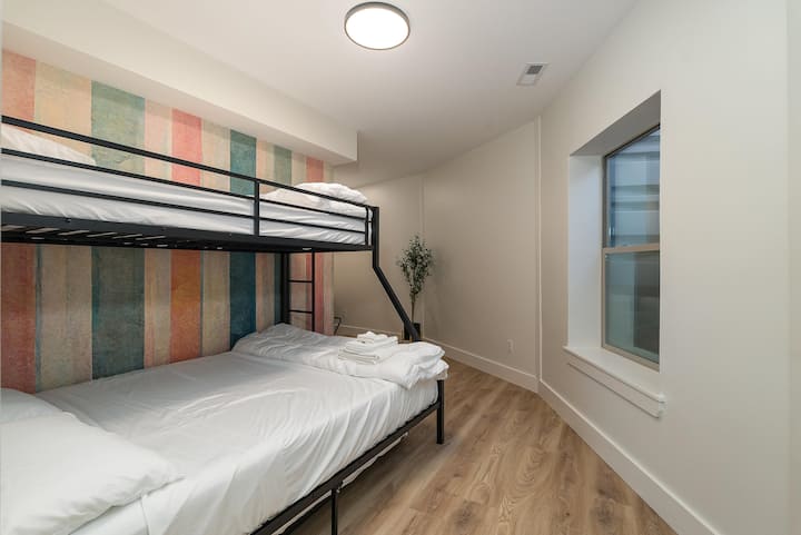 Bunk has a Twin XL over Queen, with a Twin trundle pull out, linens provided.
