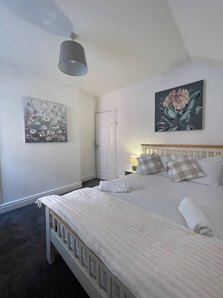 Двойно легло „Superking“ с цип и връзка, което може да се раздели на 2 единични легла 