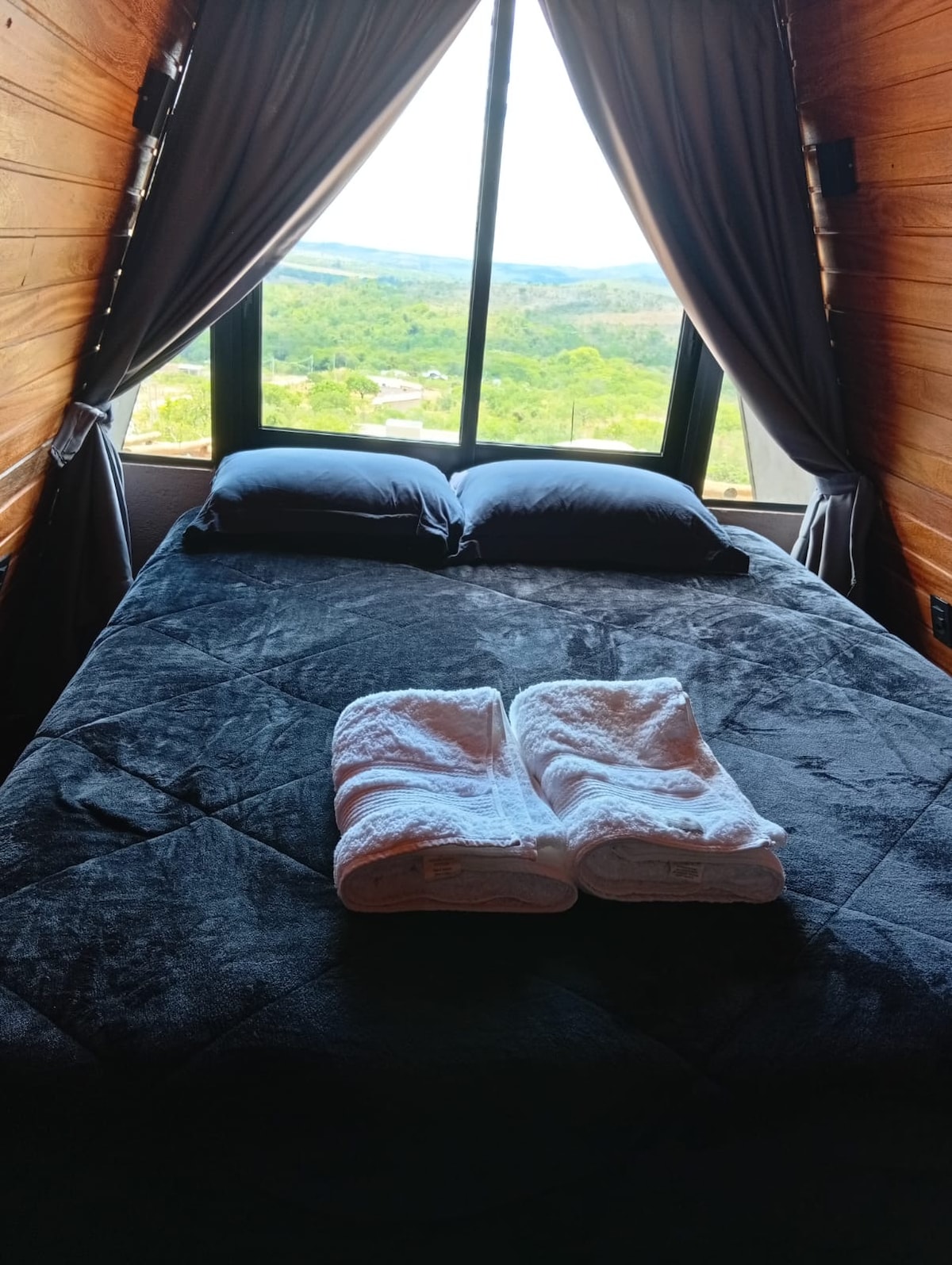Cama com vista para a serra