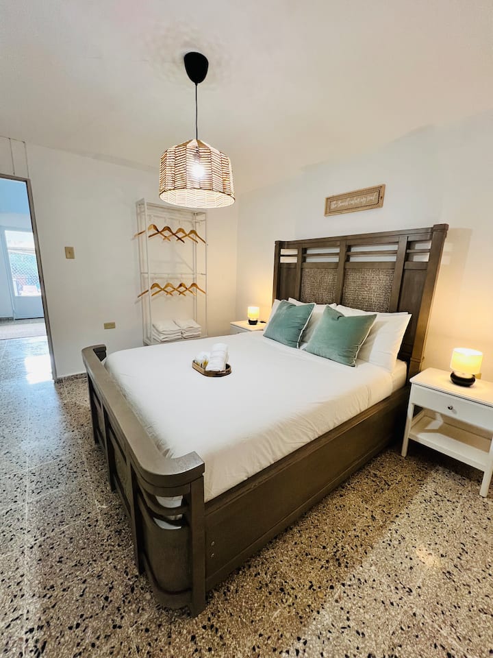 More space for your group of 10! This cozy queen bedroom in the private apartment gives part of your party a quiet, comfortable sanctuary while staying on the same property.