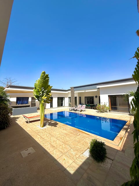 Elegant Escape Two Steps from the Beach