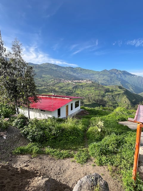 House with panoramic views of the city and mountains