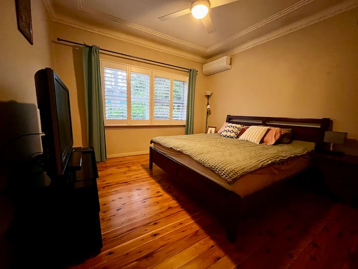 Fully air conditioned master bedroom with a king size bed