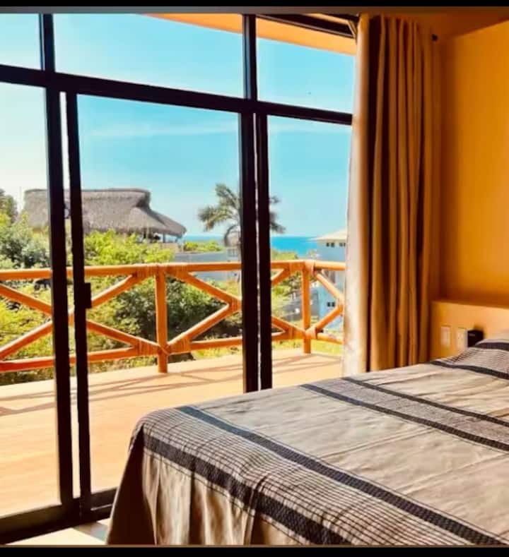 Dhomë 25 m2 me tarracë 10 m2, me pamje nga Oqeani Paqësor 